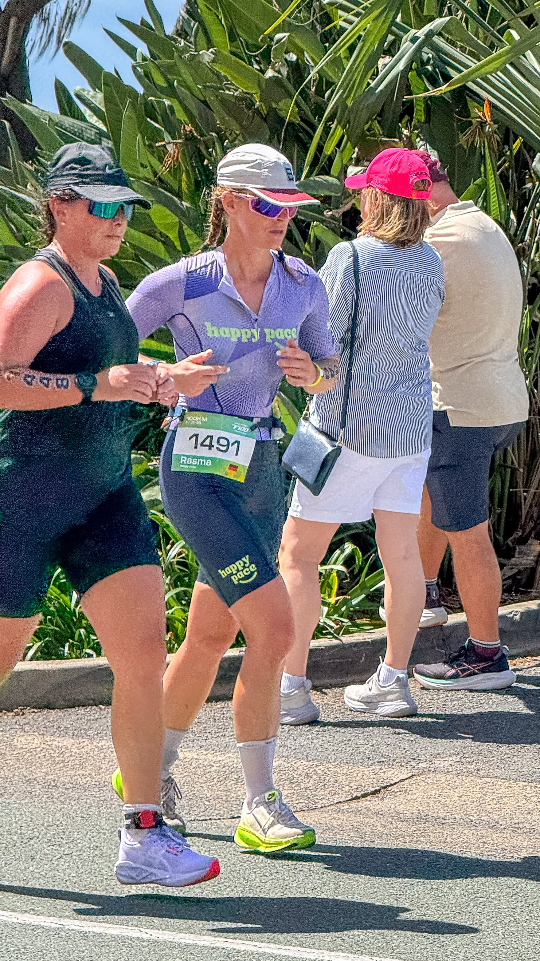 Female athlete running mid-race